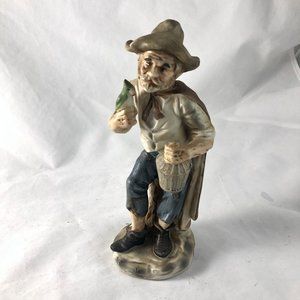 Vintage Bisque Figurine Man with Bird Whiskey Jug
